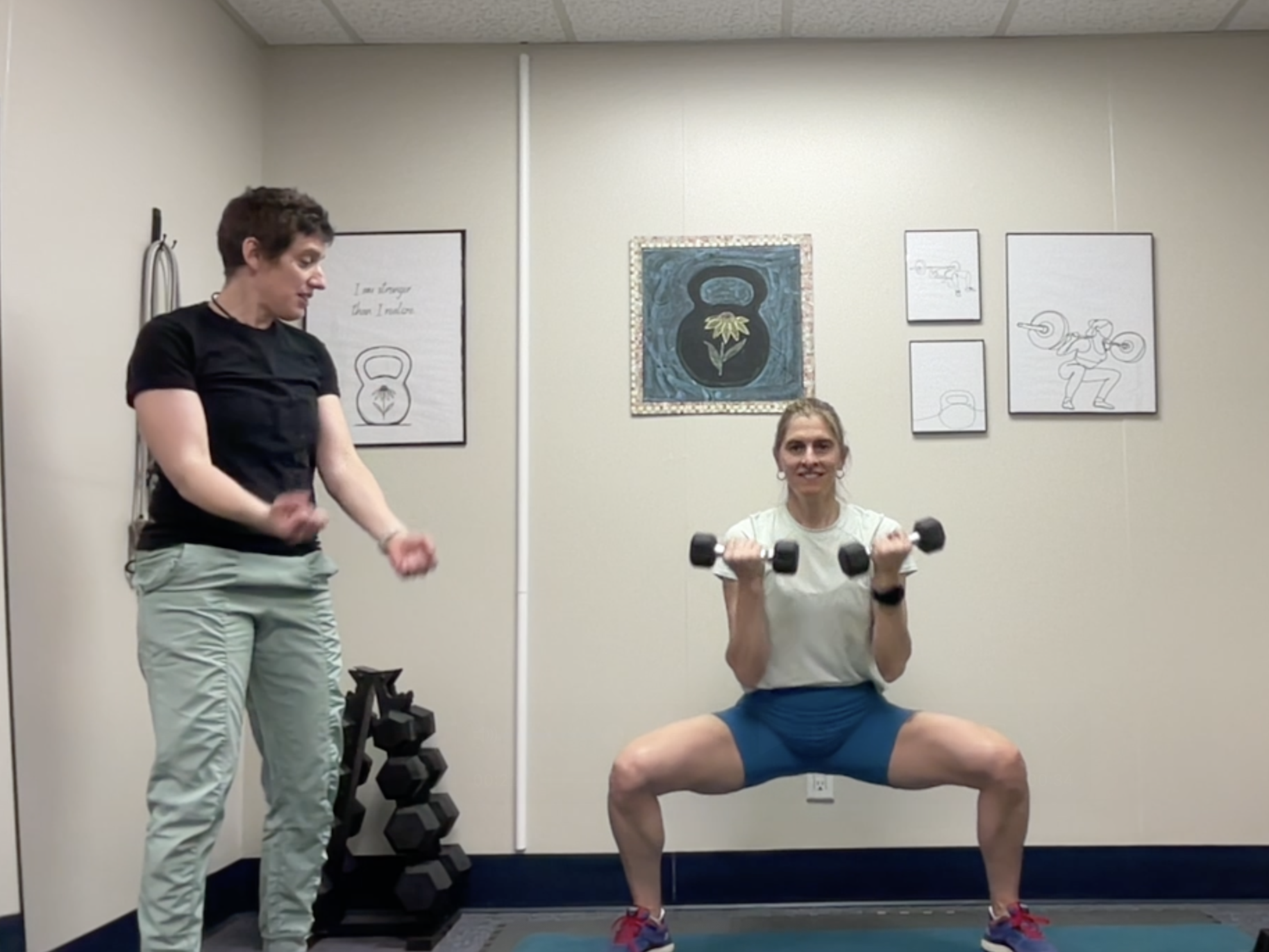 coaching sumo curls Jenn Baudreau Coaching a client